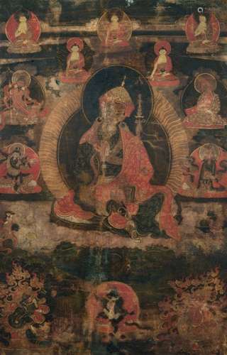 A THANGKA DEPICTING PADMASAMBHAVA, Tibet, 18th ct. The centre with Padmasambhava seated on a lotus base with his right hand holding probably the vajra while the left is supporting the kapala, wearing various garments, his face displaying a serene expression, the upper section with five different Buddha figures, flanked by two mahasiddhas and two lamas and the lower part with protective deities  - Property from a German private collection - In a velvet frame - Traces of age, worn