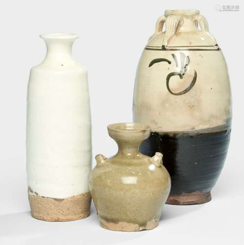 THREE VASES OF 'CIZHOU' WARE AND OTHERS, China, Yuan/Ming dynasty. A small globular vase with thin neck and cup-shaped mouth, with two small handles at the shoulder. One 'Cizhou' vase with four stylized handles at the neck, decorated with an abstract design in the typical brown tones. One an even ivory-white glaze stopping just above the foot. - Property from an old Berlin private collection, acquired at Ruth Schmidt, Berlin, 20 Dec 1986, 14 Nov 1989, and Günter Venzke, Berlin, 1986 - Minor wear, one short firing crack to the white vase's neck