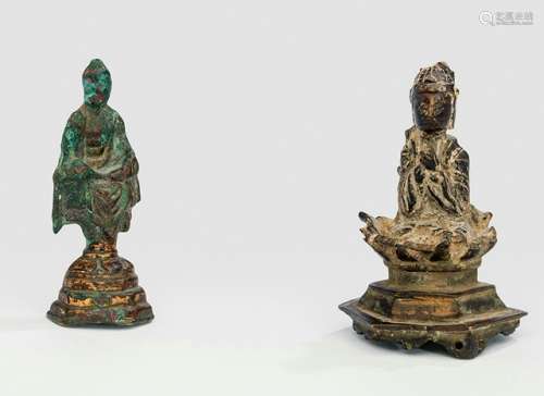 TWO BRONZE FIGURES OF BUDDHA SHAKYAMUNI, CHINA, Tang dynasty, both seated with legs crossed on a lotus throne, their hands showing various gestures and wearing monastic robes - Property from a German private collection, assembled in the 1970s and 80s - Minor damages due to age, wear
