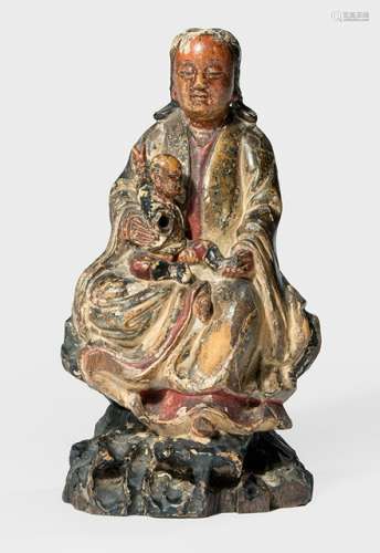 A POLYCHROME PAINTED WOODEN FIGURE OF GUANYIN SEATED ON A ROCK WITH BOY, China, early Qing dynasty - Property from an old German industrialist collection, assembled between 1950 and 1990 - Wear, slightly chipped, right hand of the boy lost