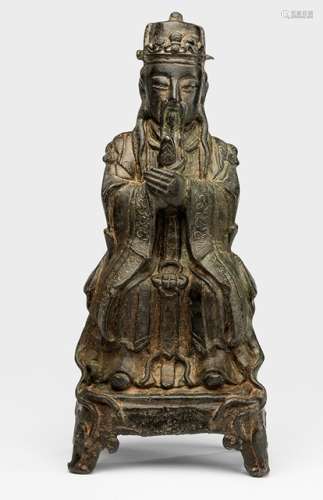 A BRONZE FIGURE OF A SEATED DAOIST OFFICIAL - Property from an old German family collection, assembled in China around 1912 - One leg with repair, minor wear