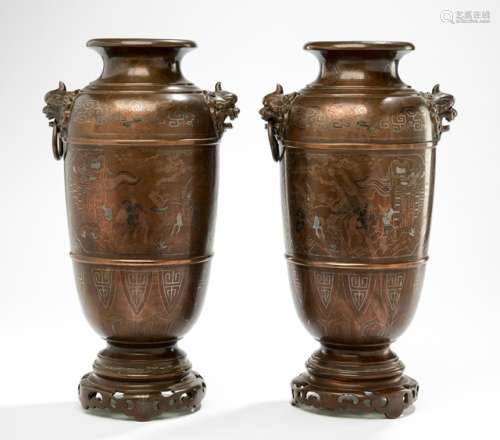 A PAIR OF BRONZE VASES DECORATED WITH FIGURAL SCENES INLAID IN SILVER AND SHAKUDO