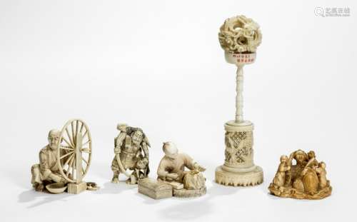 A GROUP OF FOUR OKIMONO OF PEASANTS AND A SAMURAI AND A CARVED IVORY BALL ON A STAND