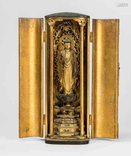 A GILT- AND BLACK-LACQUERED WOOD SHRINE DEPICTING BUDDHA SHAKYAMUNI