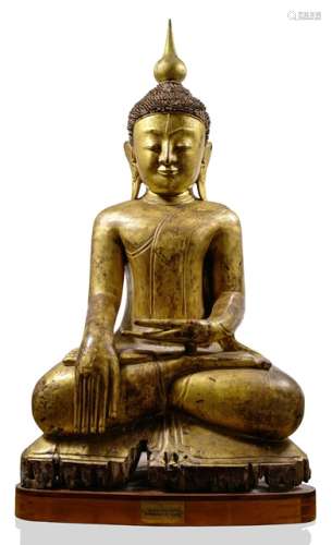 AN IMPORTANT GILT AND BLACK LACQUERED WOOD FIGURE OF BUDDHA SHAKYAMUNI