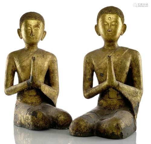 A PAIR OF GILT AND BLACK LACQUERED BRONZE WORSHIPPERS Thailand