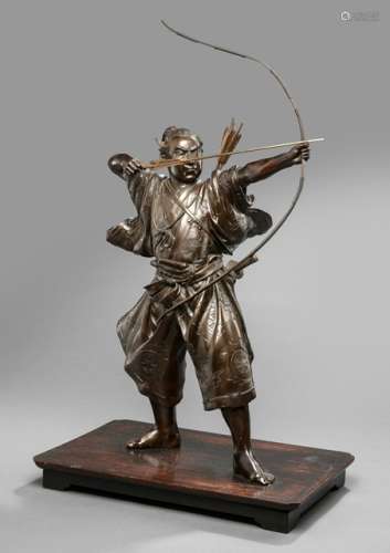 A LARGE BRONZE MODEL OF A STANDING ARCHER