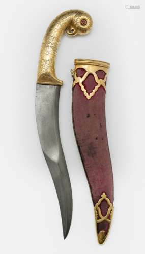 A MUGHAL-STYLE DAGGER WITH A STEEL BLADE AND GILT-PARROT-HEAD HANDLE WITH RUBY INSET EYES