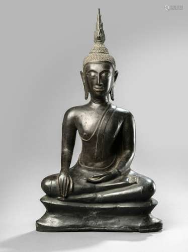 A BRONZE FIGURE OF BUDDHA SHAKYAMUNI