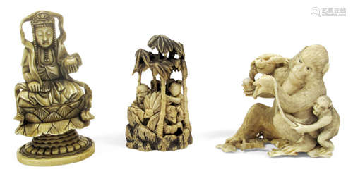 A GROUP OF THREE IVORY OKIMONO OF A MONKEY