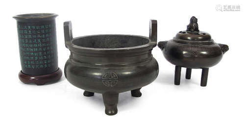 TWO BRONZE KOROS AND A BRUSH HOLDER