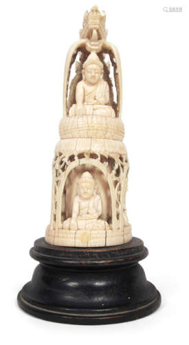 AN OPENWORK IVORY CARVING WITH DRAGON