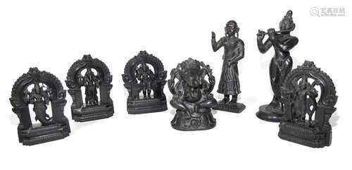 A GROUP OF SEVEN FIGURAL STONE CARVINGS