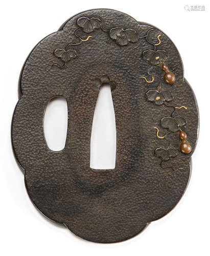 A SHAKUDO TSUBA WITH PUMPKIN TENDRILS