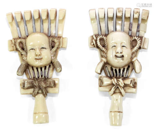 TWO IVORY NETSUKE IN SHAPE OF RAKES WITH NÔ MASKS