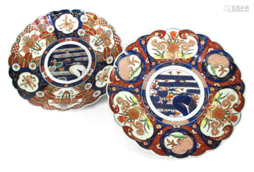 A PAIR OF LARGE IMARI PLATES WITH FLORAL DECORATION IN RESERVES