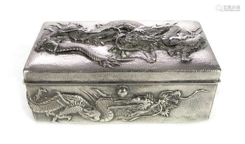 A SILVER MOUNTED WOOD BOX DECORATED WITH SWIRLING DRAGONS