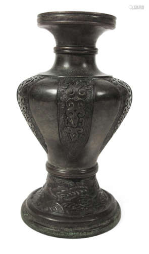 A BRONZE VASE WITH LANCETS AND WAVE DESIGN