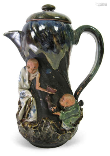 A BANKO WARE EWER AND COVER WITH FIGURAL DECORATION