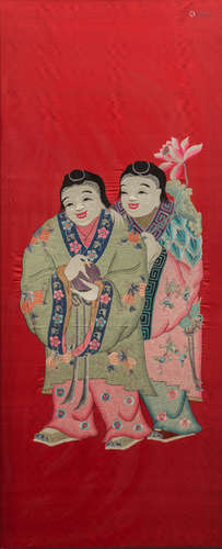 A SILK EMBROIDERY WITH TWO LADIES ON RED GROUND