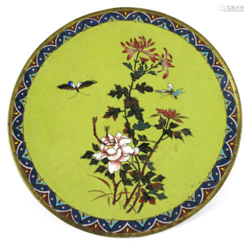 A CLOISONNE PLATE DEPICTING FLOWERS AND TWO BUTTERFLIES