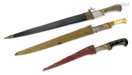 THREE VARIOUS DAGGERS WITH FLORAL DECORATIONS AND IVORY