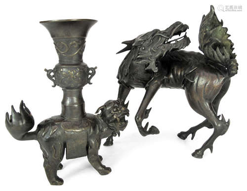 A BRONZE LION SHAPED ALTAR CANDLEHOLDER AND A QIRIN