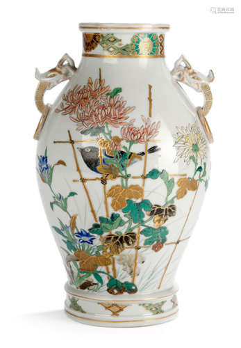 A POLYCHROME KUTANI PORCELAIN VASE DECORATED WITH A BIRD PERCHED ON A BAMBOO TRELLIS AND VARIOUS FLOWERS