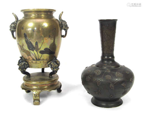 TWO BRONZE VASES WITH FLOWERS AND BIRDS IN RELIEF