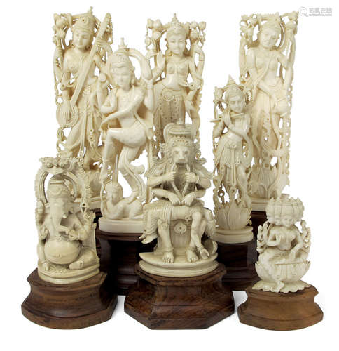 EIGHT IVORY FIGURES REPRESENTING DIFFERENT DEITIES INCLUDING SHIVA