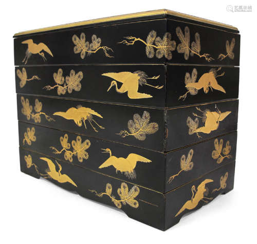 A FIVE-CASE LACQUER STAPLE BOX AND COVER DECORATED WITH CRANES AND PINE TWIGS IN GOLD LACQUER ON BLACK GROUND