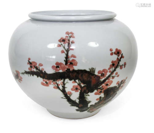 A PORCELAIN VASE WITH BLOOMING CHERRY BRANCH