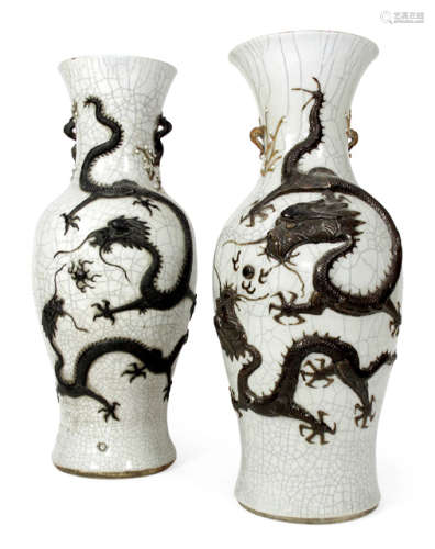 A PAIR OF CRACKLE GLAZED PORCELAIN VASES WITH BROWN DRAGONS IN RELIEF