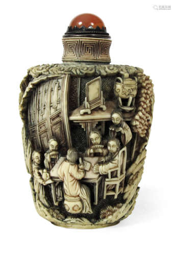 A LARGE IVORY SNUFFBOTTLE WITH TWO CARVED SCENES OF MUSICIENS