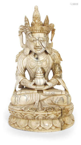 AN IVORY FIGURE OF AMITAYUS