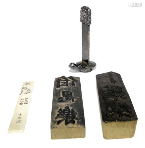 TWO PAPERWEIGHTS AND TWO WOODEN STAMPS WITH CHARACTERS