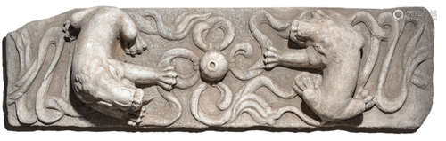 A STONE RELIEF DEPICTING TWO BUDDHIST LIONS