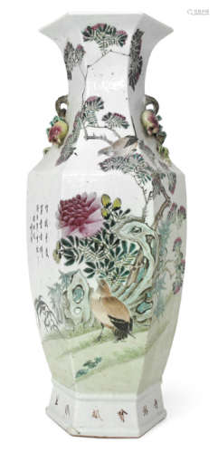 A HEXAGONAL AND POLYCHROME DECORATED PORCELAIN VASE WITH PLASTIC PEACH HANDLES DEPICTING A FO HOUND AND QUAILS IN FLOWERING BRANCHES