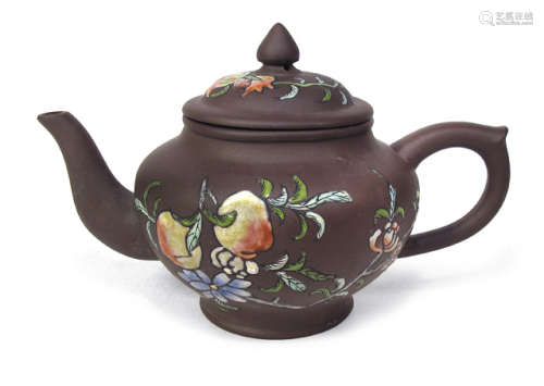 A YIXING TEAPOT WITH POLYCHROME POMEGRANATE PATTERN