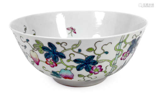 A POLYCHROME DECORATED PORCELAIN BOWL DEPICTING FRUITS AND BAMBOO