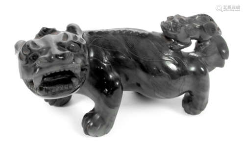A WELL CARVED AGATE MODEL OF A QILIN