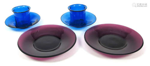 FOUR BLUE AND VIOLET GLASS SAUCERS AND TWO CUPS