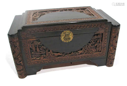 A CARVED WOOD CHEST