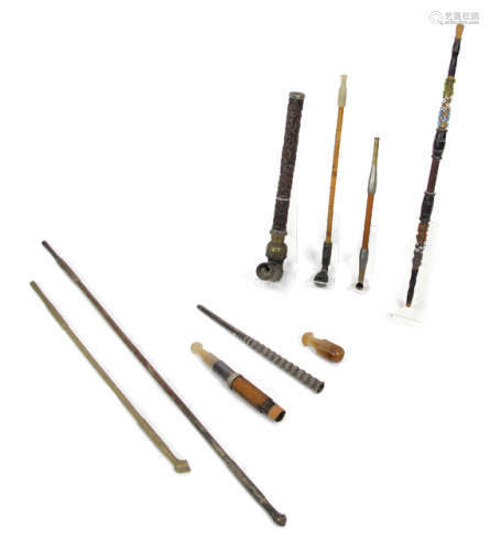 A GROUP OF EIGHT OPIUM PIPES