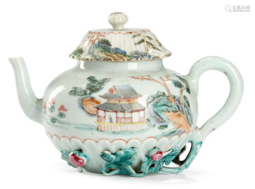 A POLYCHROME DECORATED PORCELAIN TEAPOT DEPICTING A LANDSCAPE