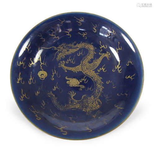 A POWDERBLUE AND GOLD DECORATED PORCELAIN DISH DEPICTING A DRAGON
