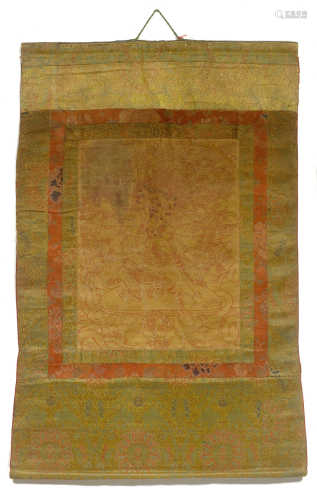 A GOLD-GROUND THANGKA WITH A WRATHFUL DEITY, Tibet, 18th c. 41.5x33 cm. Brocade mounting. Wrinkled.