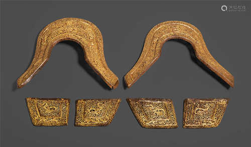 A SET OF GILT IRON OPENWORK REPOUSSE SADDLE PLATES.