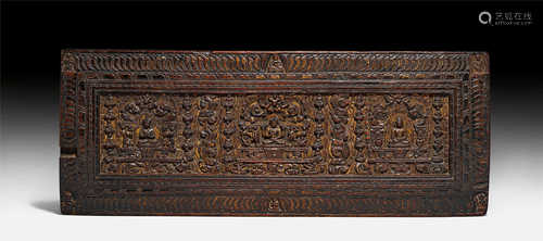 A CARVED SUTRA COVER OF VAIROCANA, SHADAKSHARI AND SHAKYAMUNI.