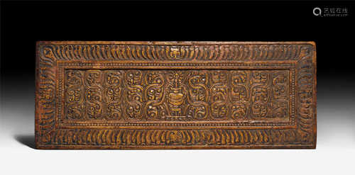 A CARVED SUTRA COVER WITH PAINTED BACK.